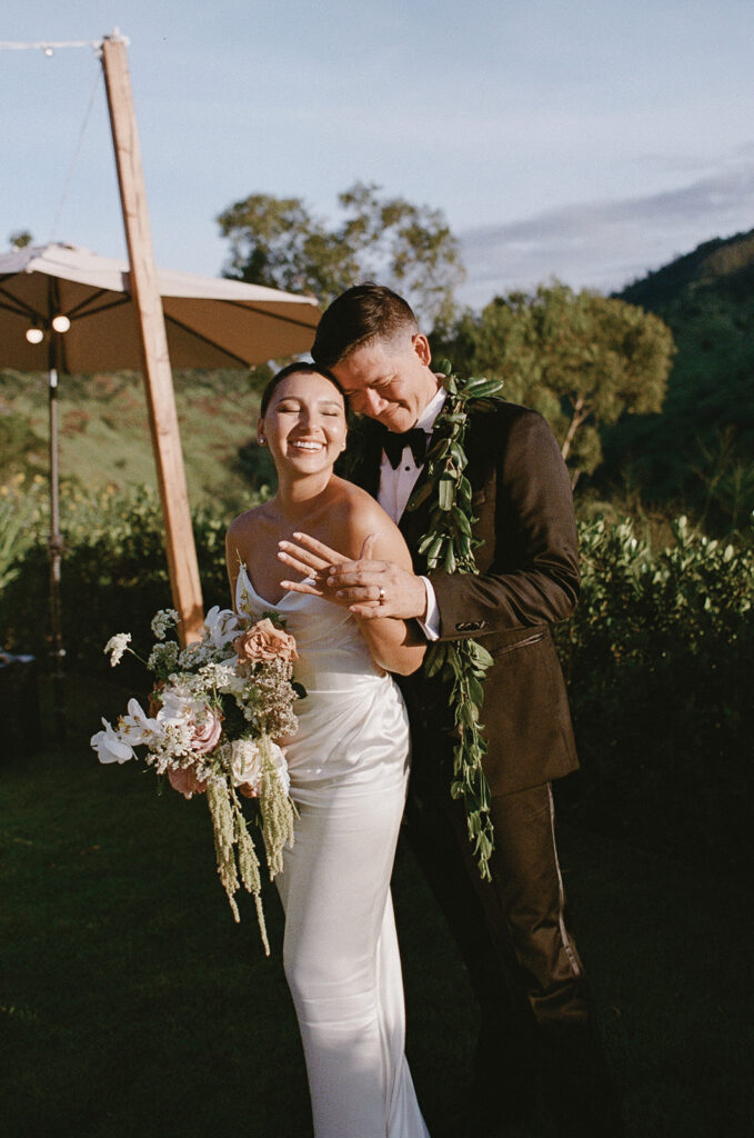 Sunset portrait of bride and groom