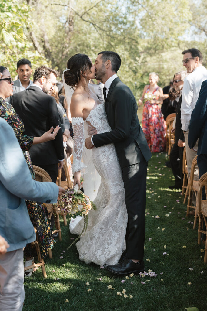 Bride and groom kiss after San Luis Obispo wedding ceremony