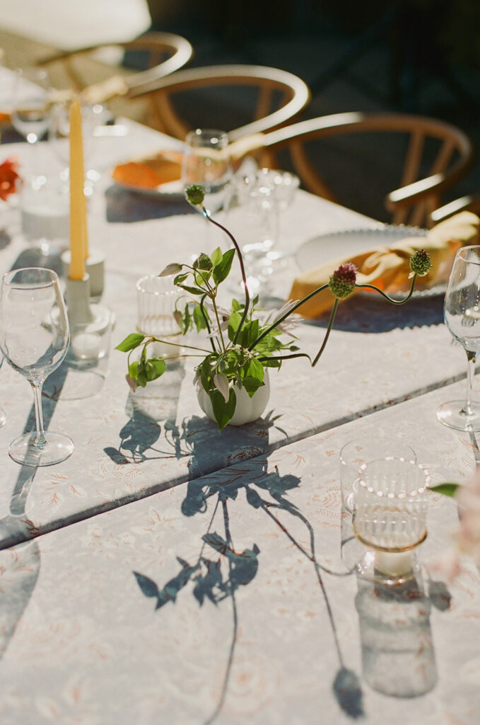 Vibrant San Luis Obispo wedding reception tablescape florals