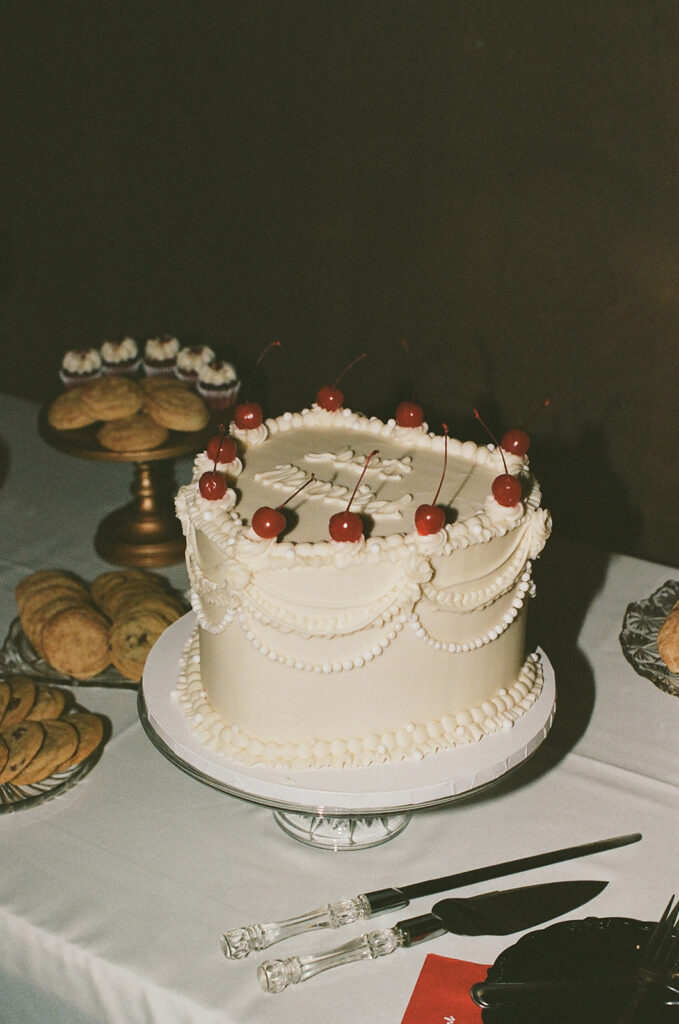 Film closeup of heart-shaped wedding cake