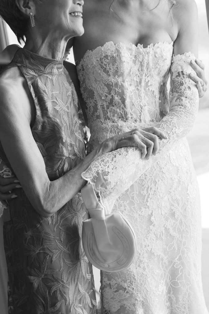 Close up bride getting ready with her grandmother