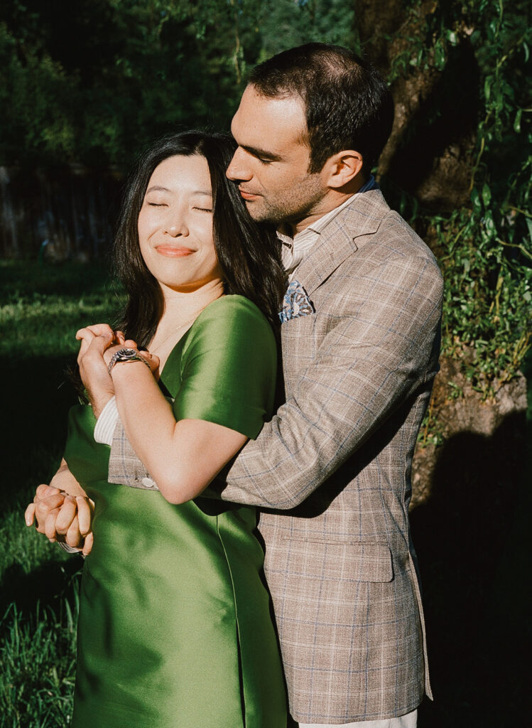 Bride and groom-to-be embracing during Sonoma rehearsal dinner