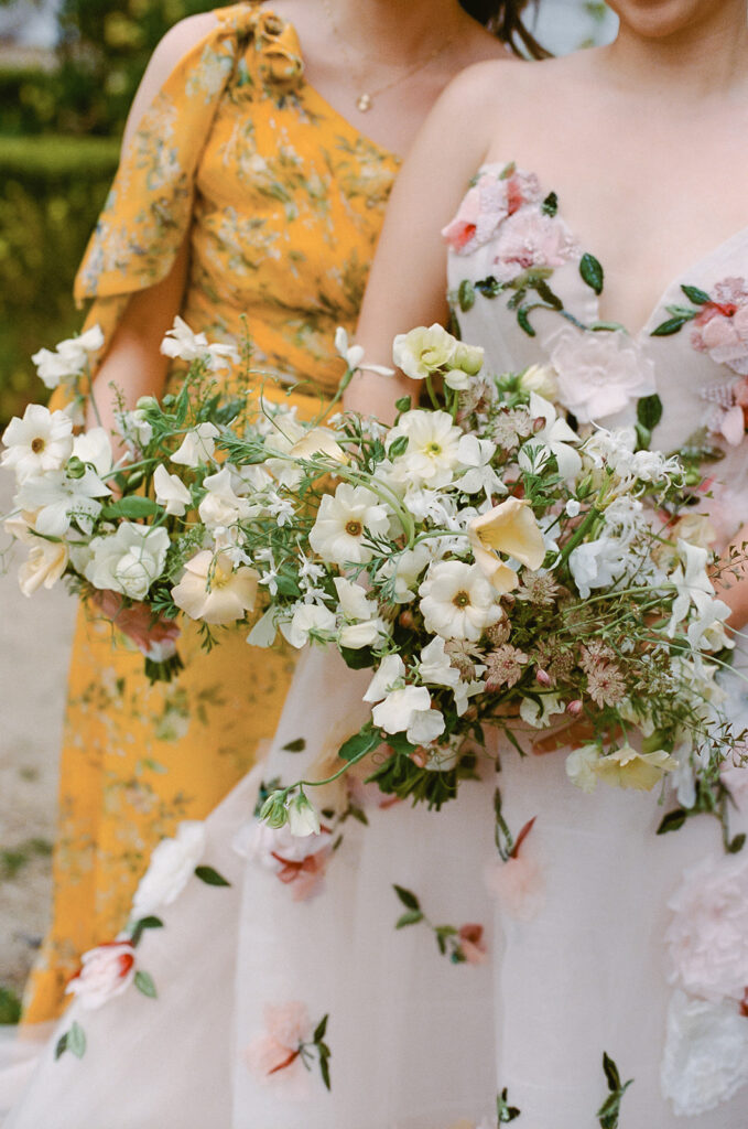 Bride standing beside maid-of-honor at elevated Sonoma, CA, wedding