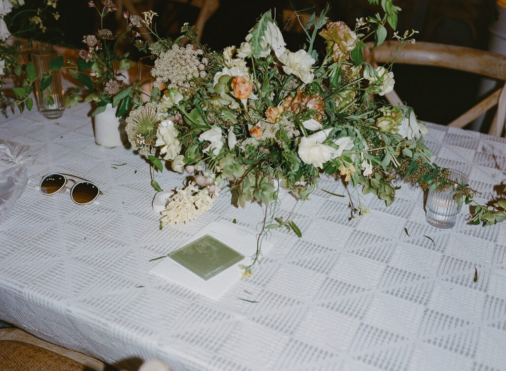 Late-night elevated wedding reception centerpiece