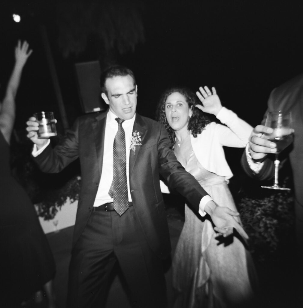 Groom dancing at elevated Sonoma, CA, wedding reception